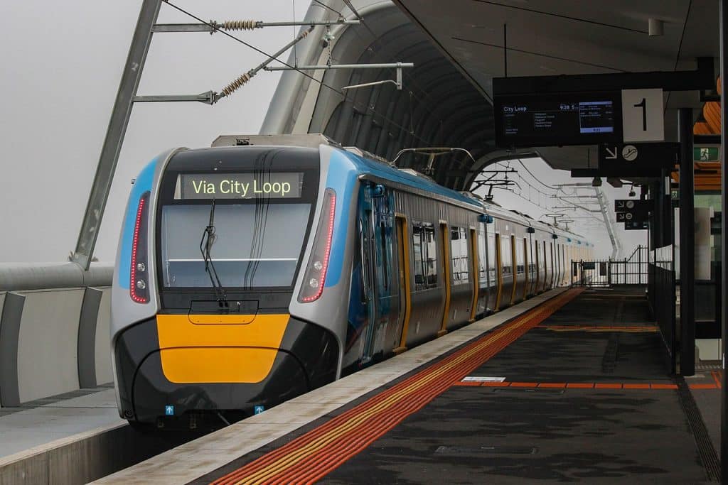 A metro train leaving station, Melbourne advertising agency